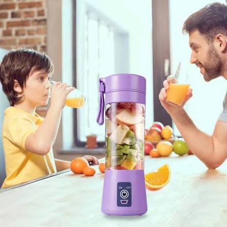 Family using portable blender juicer cup at home