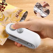 Portable mini heat sealing machine sealing a snack bag