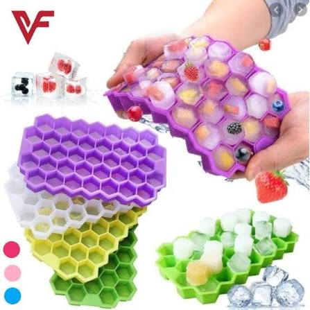 Honeycomb silicone ice tray in purple green yellow with fruit ice cubes