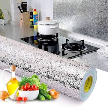 Aluminum foil kitchen wall sticker applied behind stove