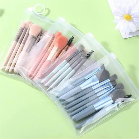Mini makeup brush sets in pink and blue with transparent zip pouches