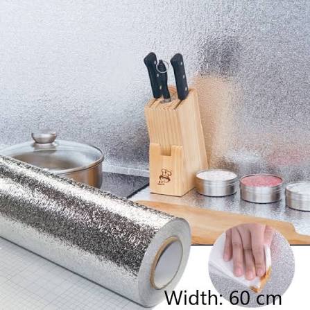 Aluminum foil kitchen wall sticker applied behind stove